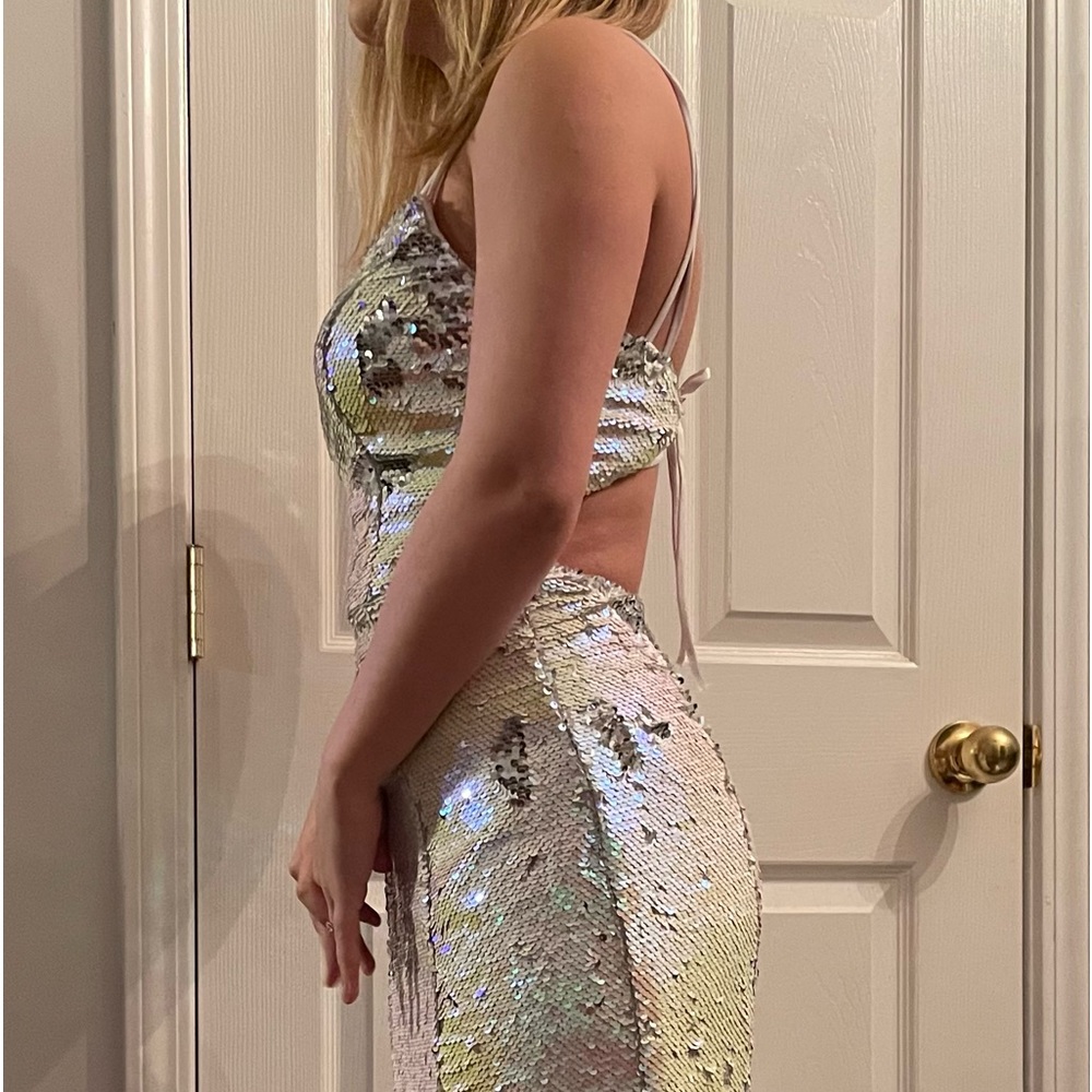 Color changing sequins.  Back strap may have to be replaced.